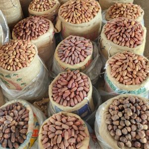 a pile of bags filled with lots of beans